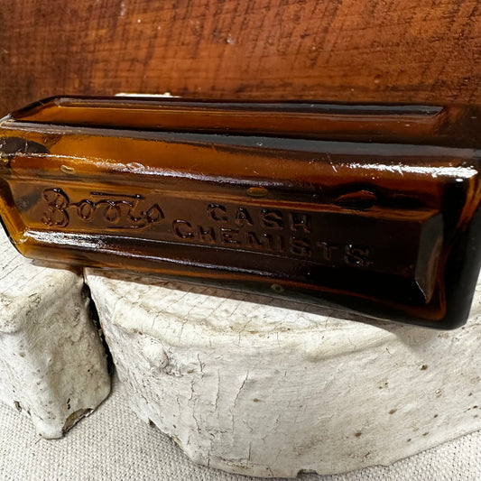 Tall Boot’s Cash Chemists Square Amber Bottle