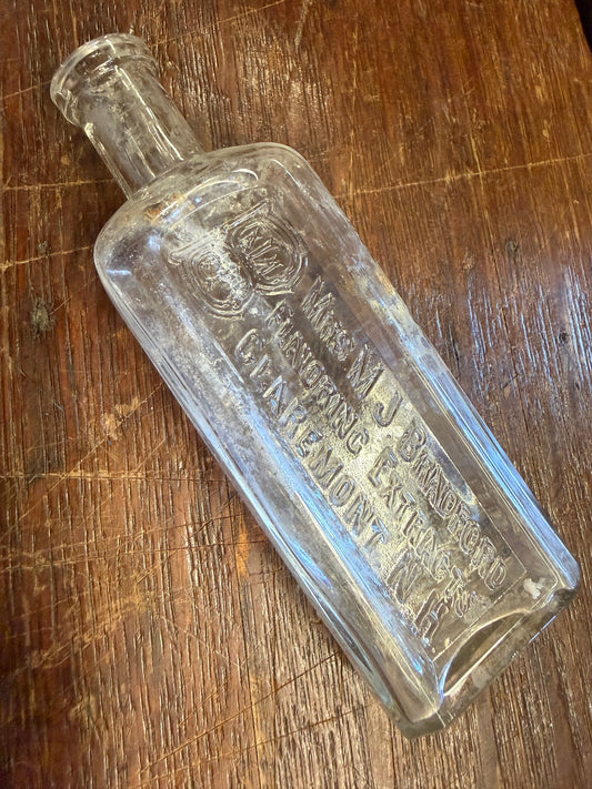 Mrs. M J Bradford Extract Bottle