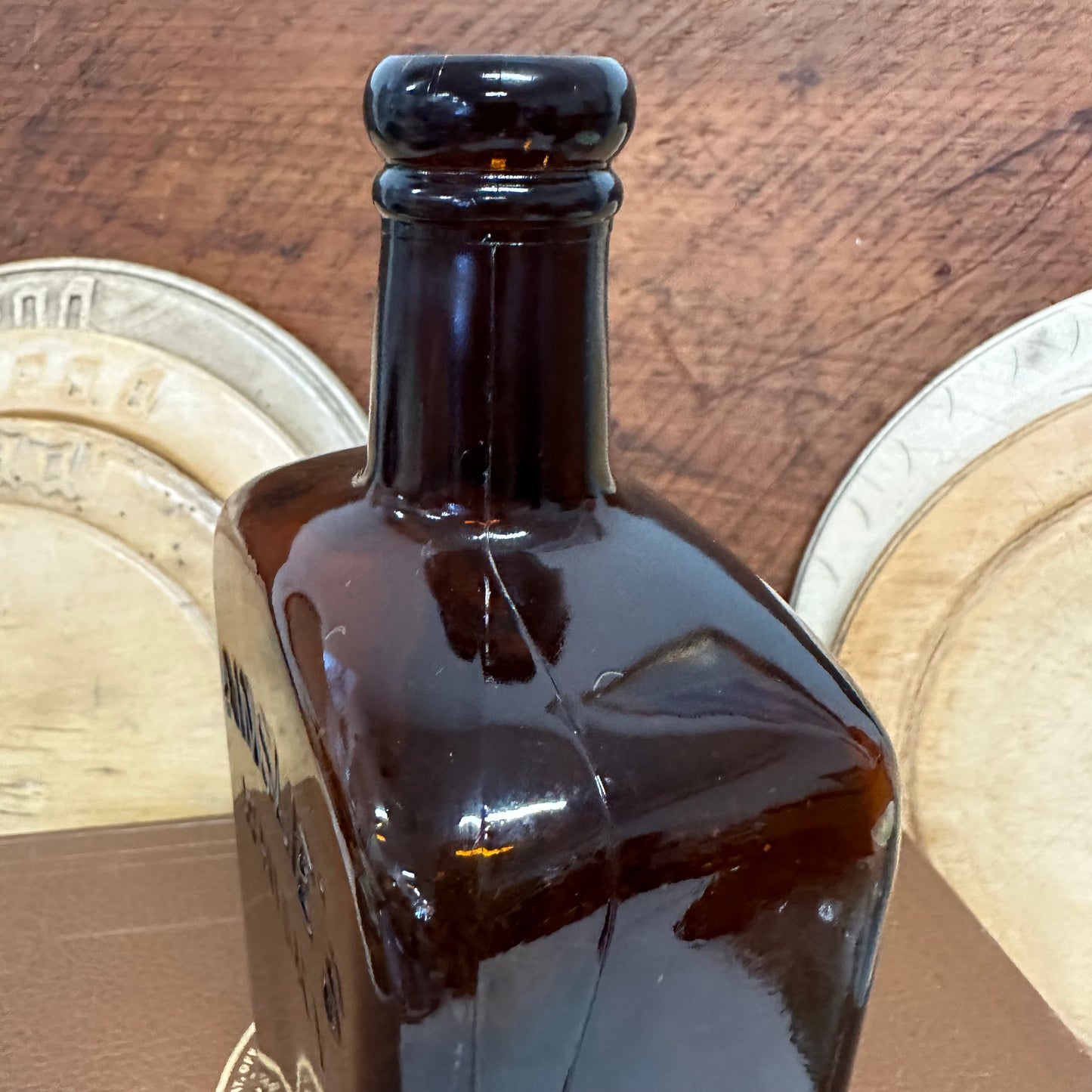 Ainslie’s Amber Whisky Bottle