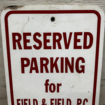 Two Reserved Parking Signs Field & Field